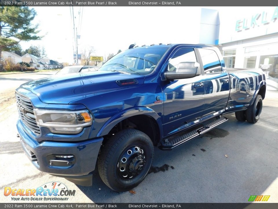 Front 3/4 View of 2022 Ram 3500 Laramie Crew Cab 4x4 Photo #11