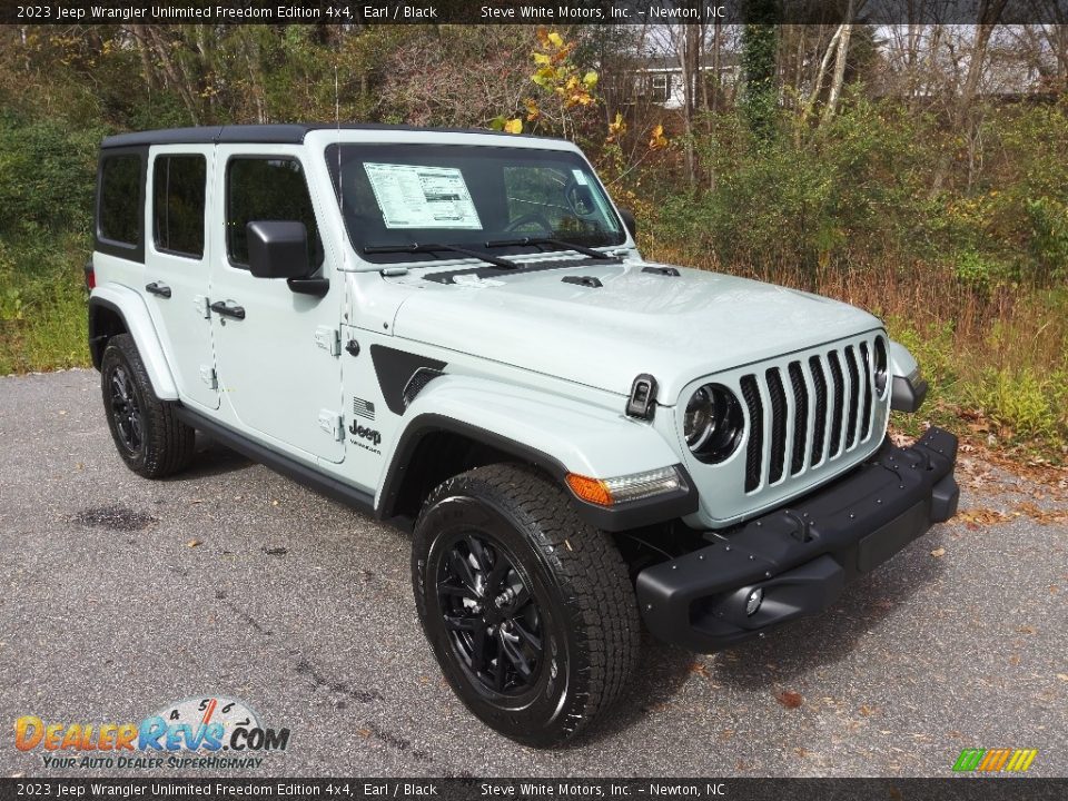 Front 3/4 View of 2023 Jeep Wrangler Unlimited Freedom Edition 4x4 Photo #4