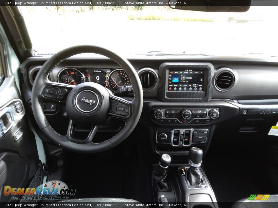Dashboard of 2023 Jeep Wrangler Unlimited Freedom Edition 4x4 Photo #20