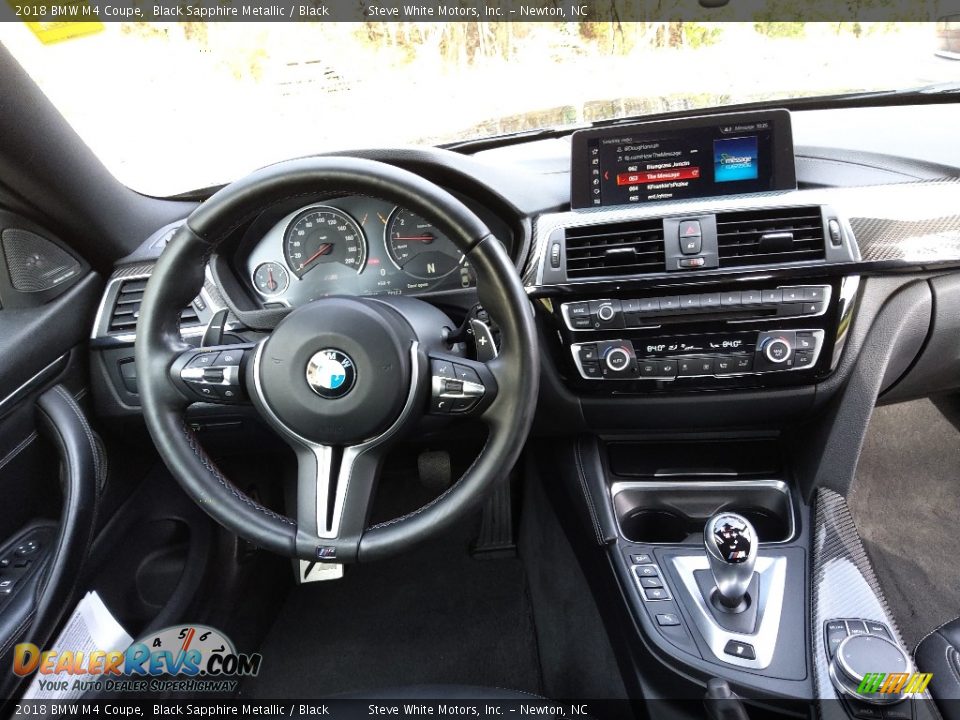 Dashboard of 2018 BMW M4 Coupe Photo #19