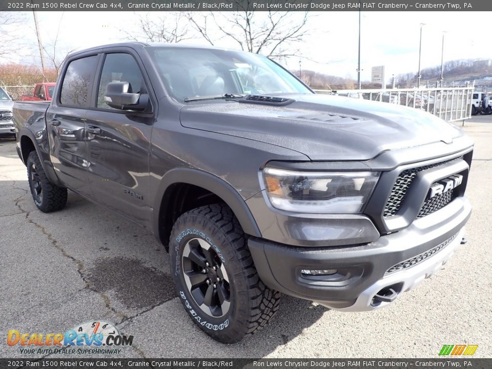 Front 3/4 View of 2022 Ram 1500 Rebel Crew Cab 4x4 Photo #7