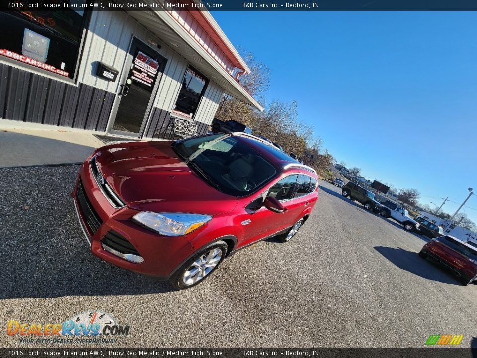 2016 Ford Escape Titanium 4WD Ruby Red Metallic / Medium Light Stone Photo #23