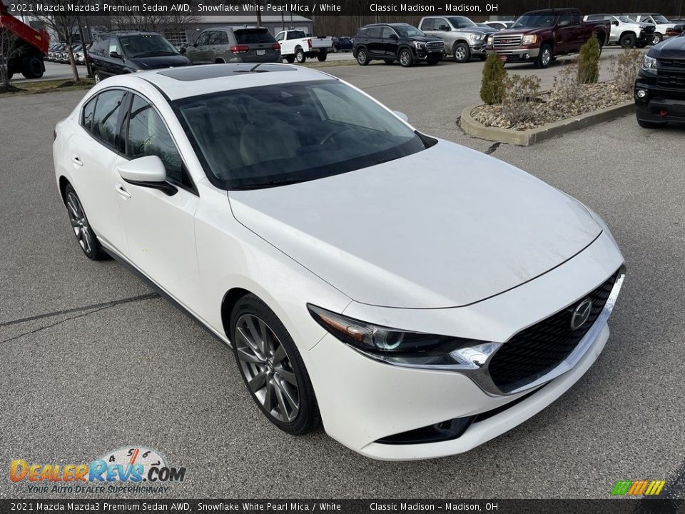 Front 3/4 View of 2021 Mazda Mazda3 Premium Sedan AWD Photo #4