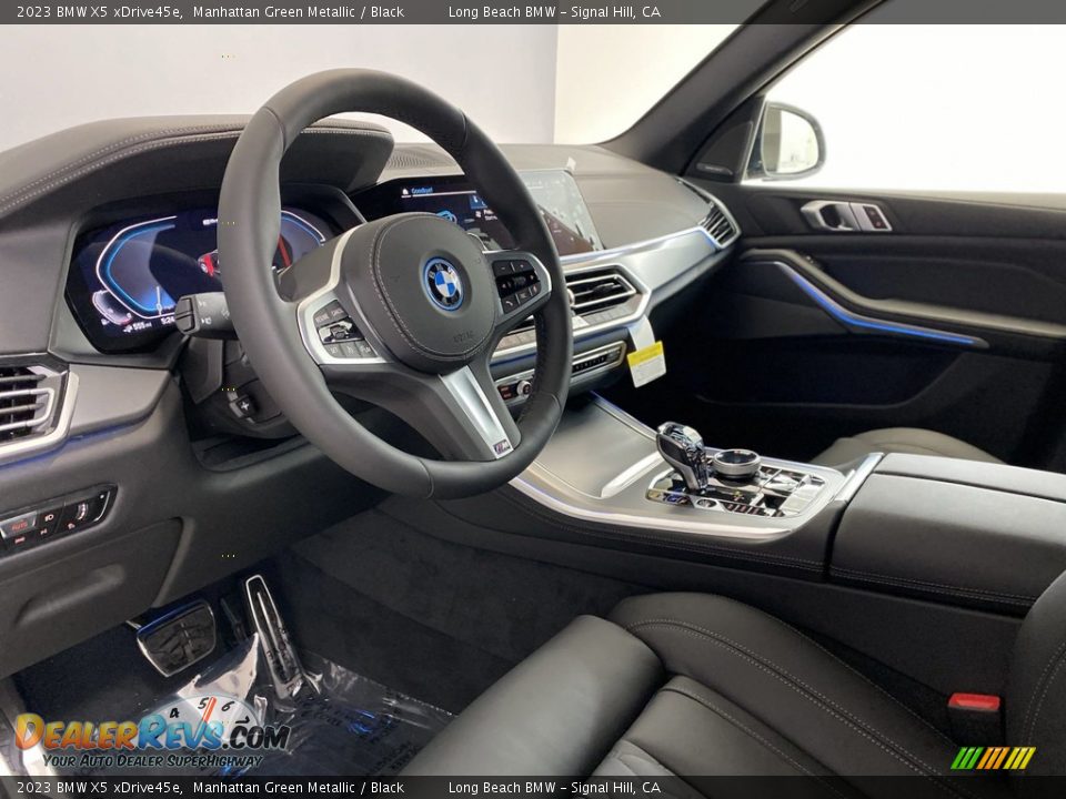 Front Seat of 2023 BMW X5 xDrive45e Photo #12