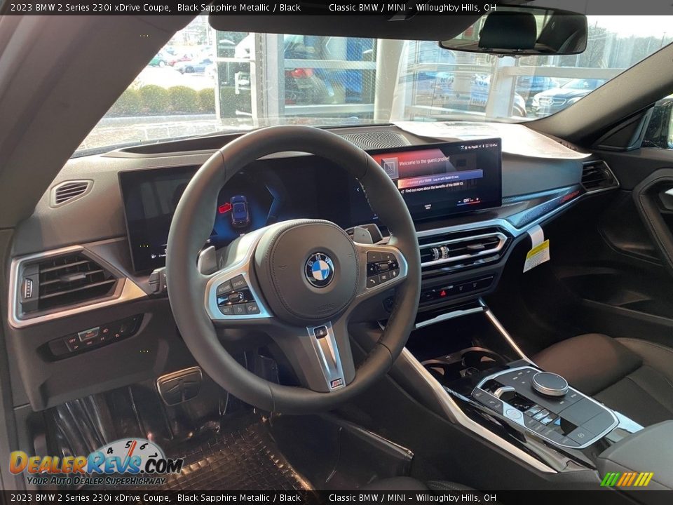 Dashboard of 2023 BMW 2 Series 230i xDrive Coupe Photo #4