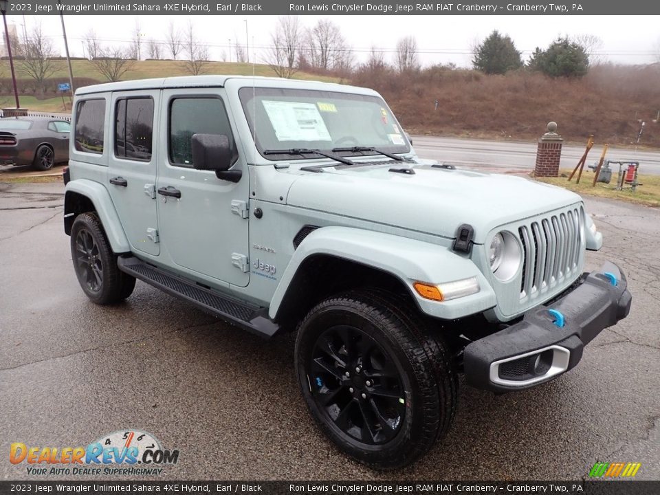 Front 3/4 View of 2023 Jeep Wrangler Unlimited Sahara 4XE Hybrid Photo #7
