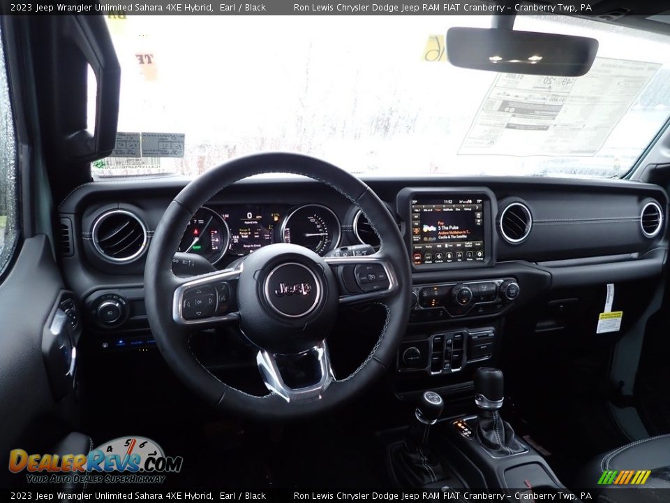 Dashboard of 2023 Jeep Wrangler Unlimited Sahara 4XE Hybrid Photo #13