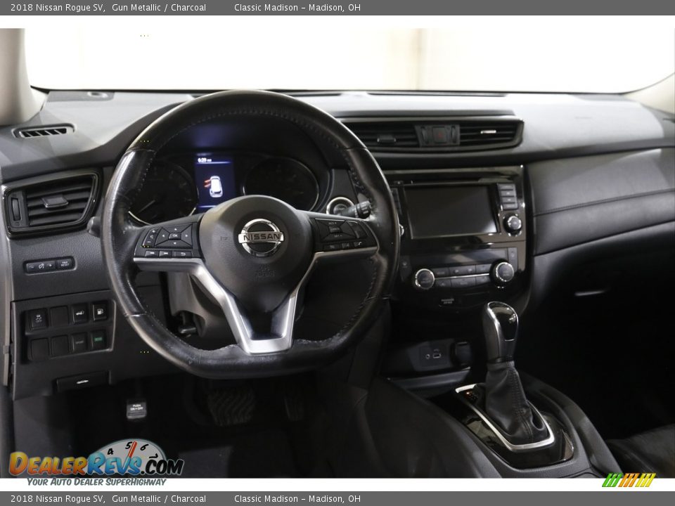 Dashboard of 2018 Nissan Rogue SV Photo #6