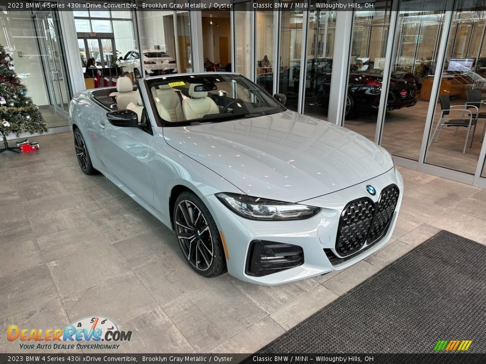 Front 3/4 View of 2023 BMW 4 Series 430i xDrive Convertible Photo #1