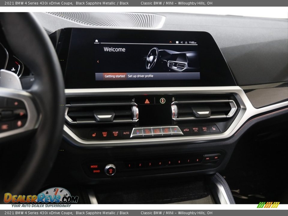 Controls of 2021 BMW 4 Series 430i xDrive Coupe Photo #9