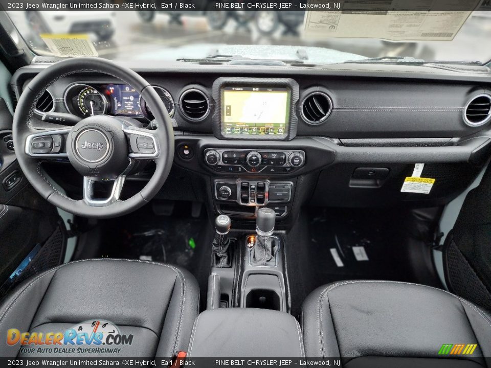 Front Seat of 2023 Jeep Wrangler Unlimited Sahara 4XE Hybrid Photo #9