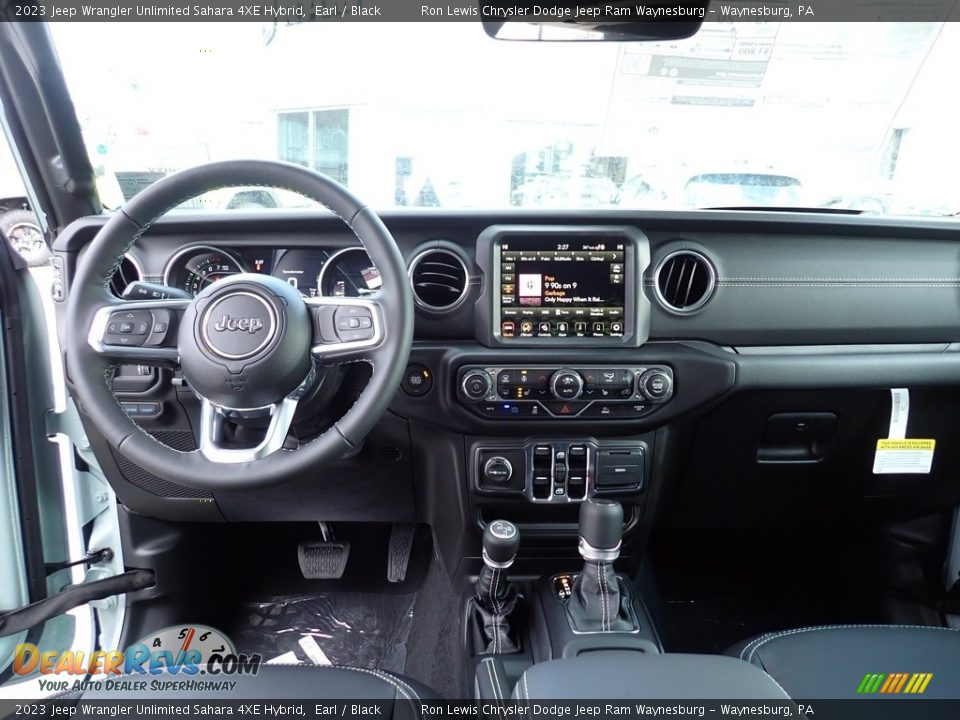 Dashboard of 2023 Jeep Wrangler Unlimited Sahara 4XE Hybrid Photo #13