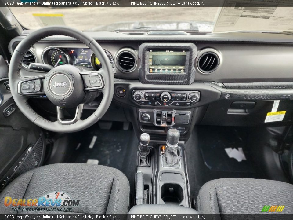 Dashboard of 2023 Jeep Wrangler Unlimited Sahara 4XE Hybrid Photo #9