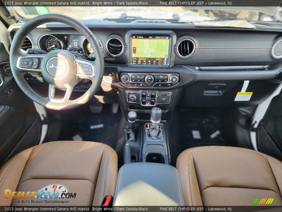 Dashboard of 2023 Jeep Wrangler Unlimited Sahara 4XE Hybrid Photo #9