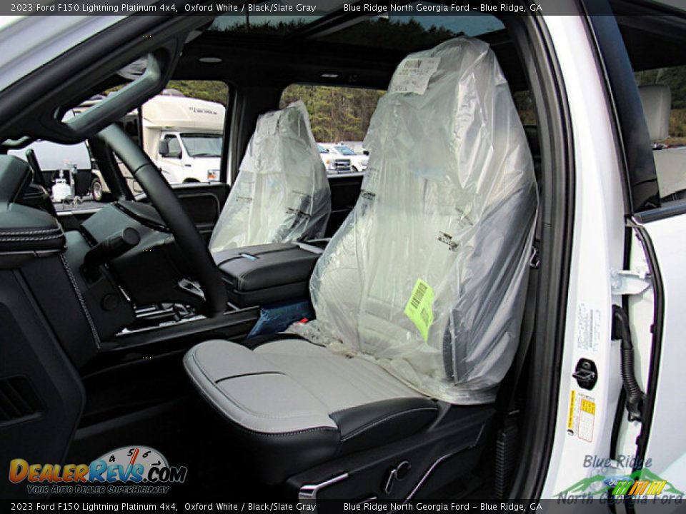 Front Seat of 2023 Ford F150 Lightning Platinum 4x4 Photo #11