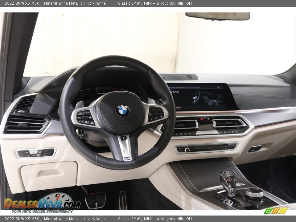 Dashboard of 2022 BMW X5 M50i Photo #6