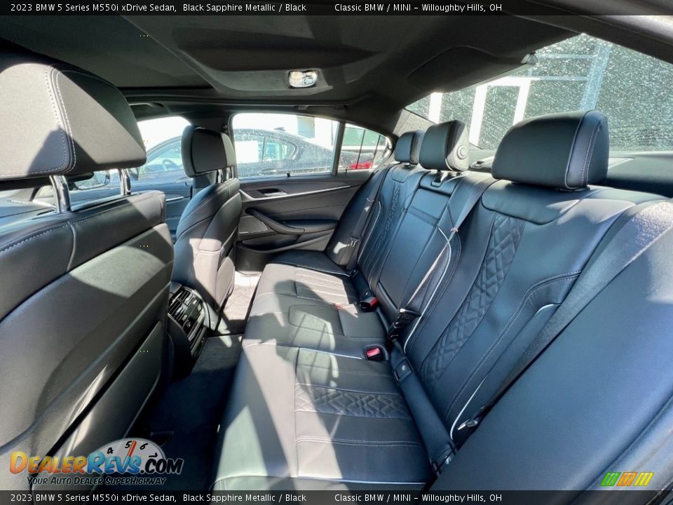 Rear Seat of 2023 BMW 5 Series M550i xDrive Sedan Photo #6