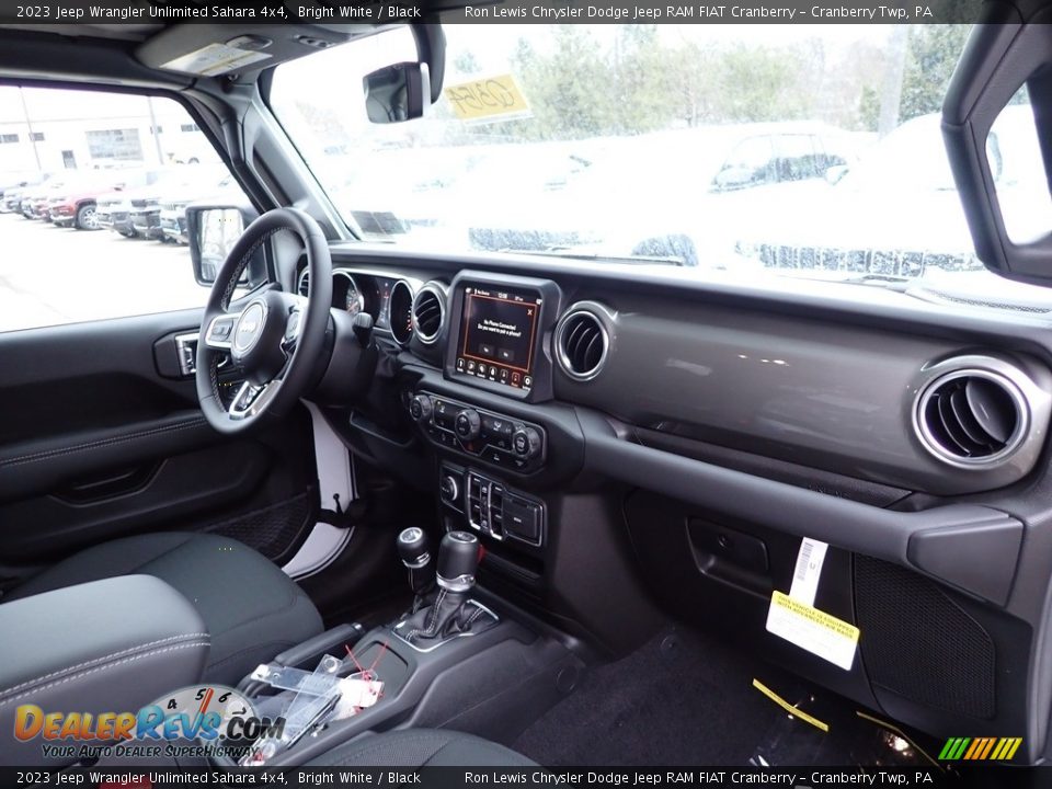 Dashboard of 2023 Jeep Wrangler Unlimited Sahara 4x4 Photo #11