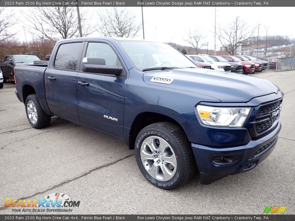 Front 3/4 View of 2023 Ram 1500 Big Horn Crew Cab 4x4 Photo #7