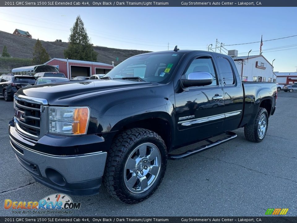 Front 3/4 View of 2011 GMC Sierra 1500 SLE Extended Cab 4x4 Photo #3