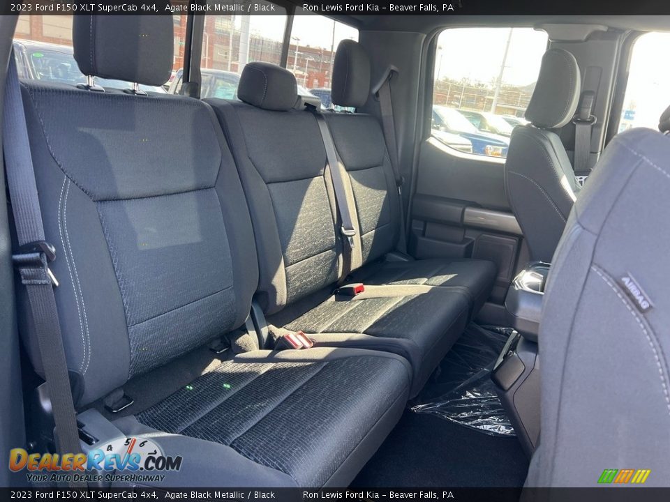 Rear Seat of 2023 Ford F150 XLT SuperCab 4x4 Photo #11