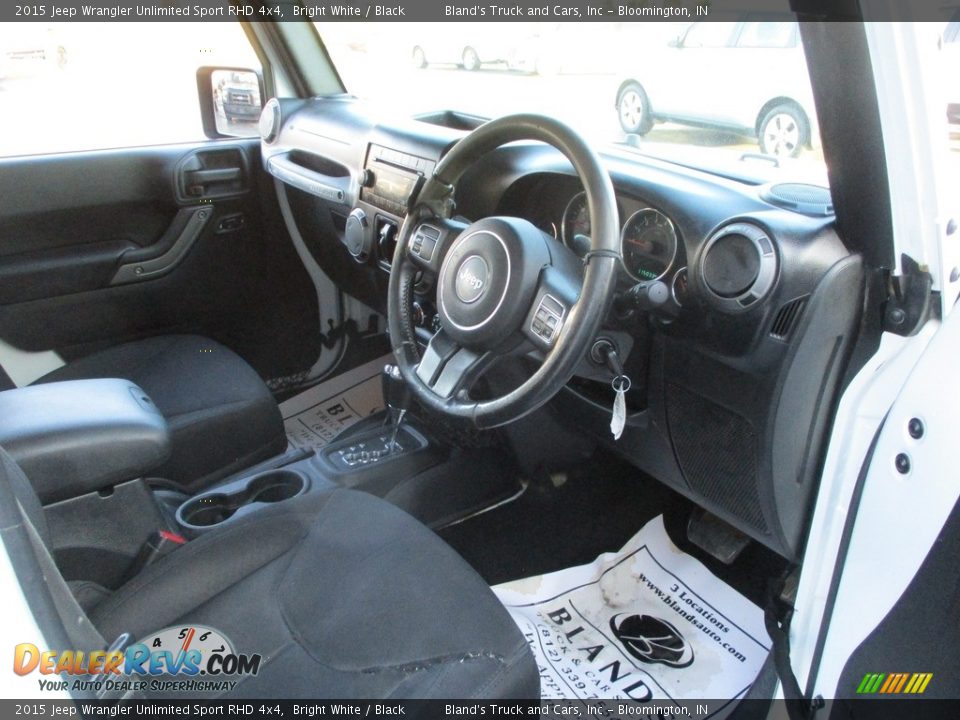 Front Seat of 2015 Jeep Wrangler Unlimited Sport RHD 4x4 Photo #6