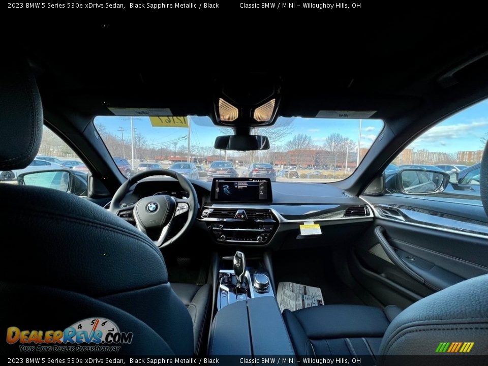 Dashboard of 2023 BMW 5 Series 530e xDrive Sedan Photo #7