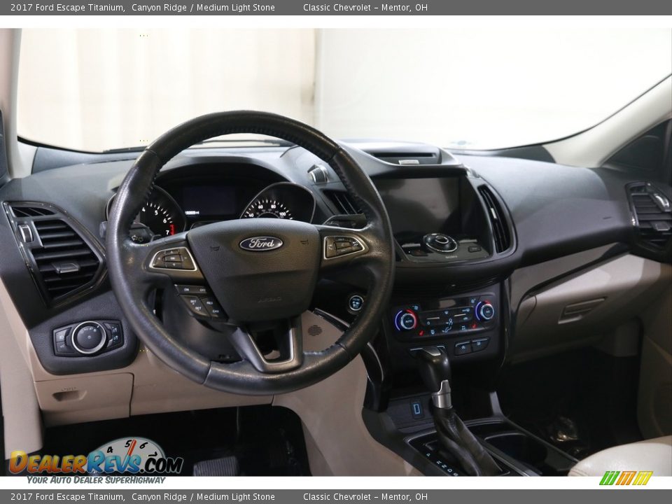 Dashboard of 2017 Ford Escape Titanium Photo #7