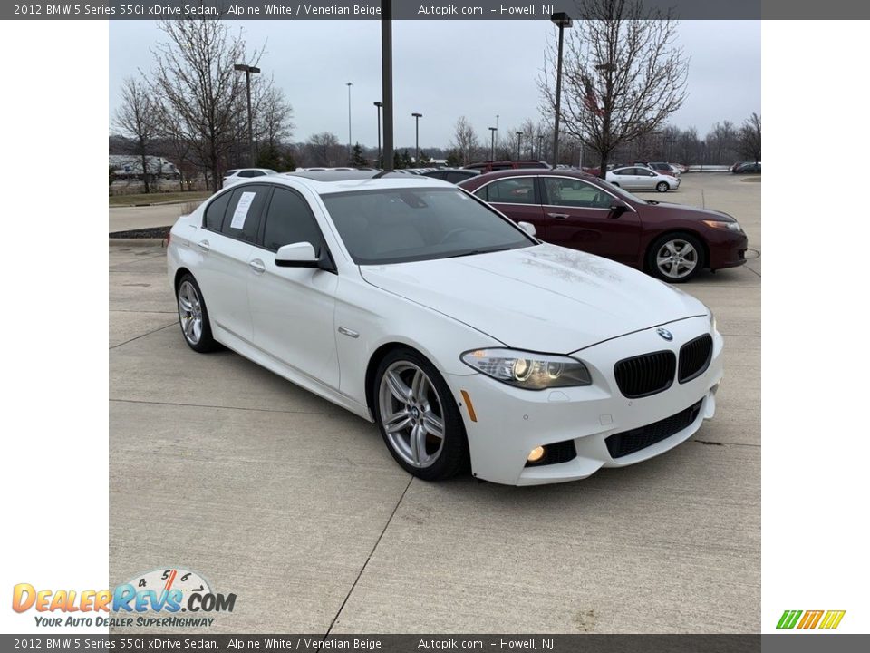 Front 3/4 View of 2012 BMW 5 Series 550i xDrive Sedan Photo #7