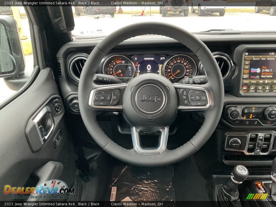 2023 Jeep Wrangler Unlimited Sahara 4x4 Steering Wheel Photo #5