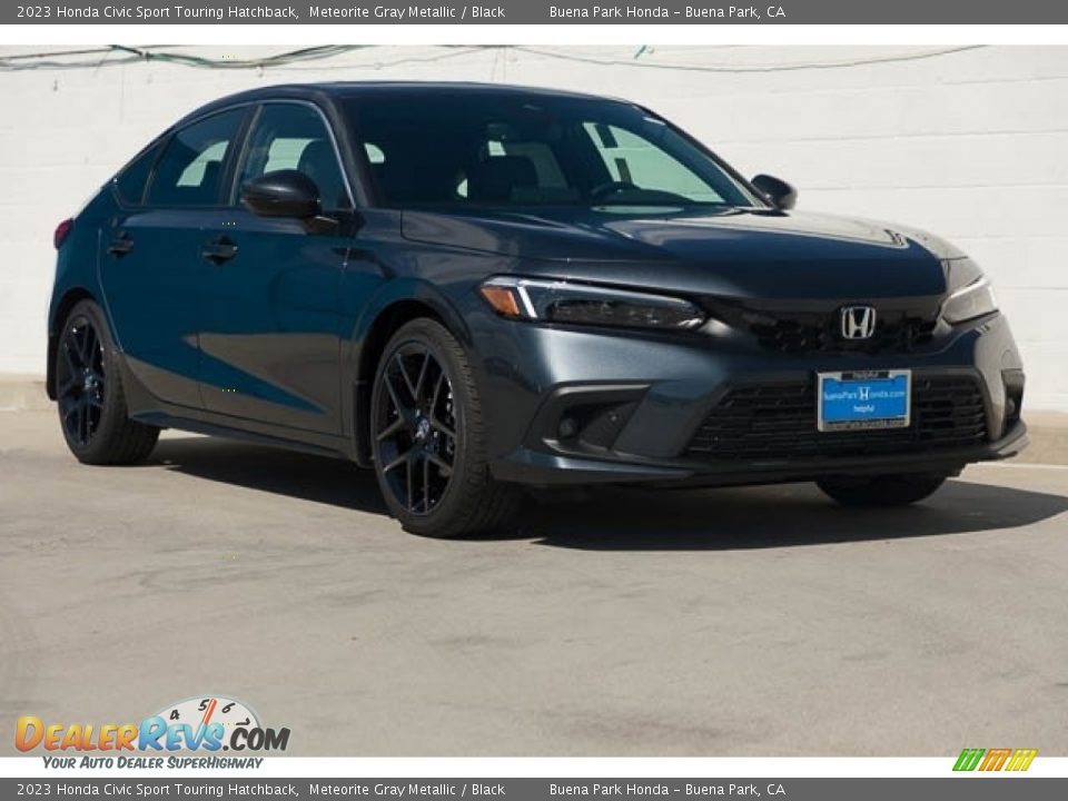 Front 3/4 View of 2023 Honda Civic Sport Touring Hatchback Photo #1