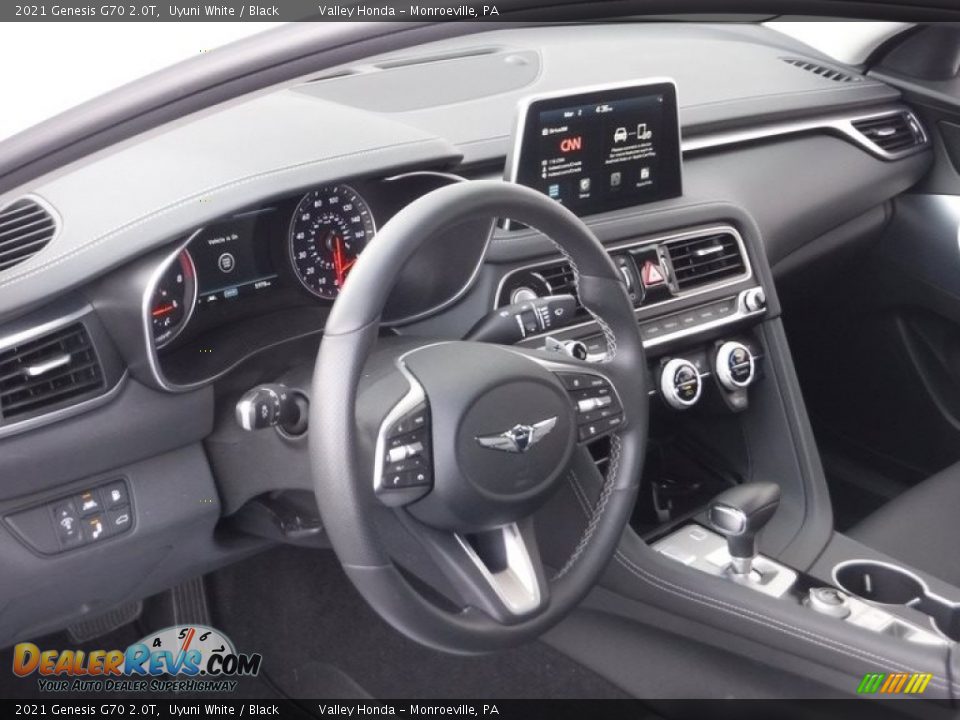 Dashboard of 2021 Genesis G70 2.0T Photo #13