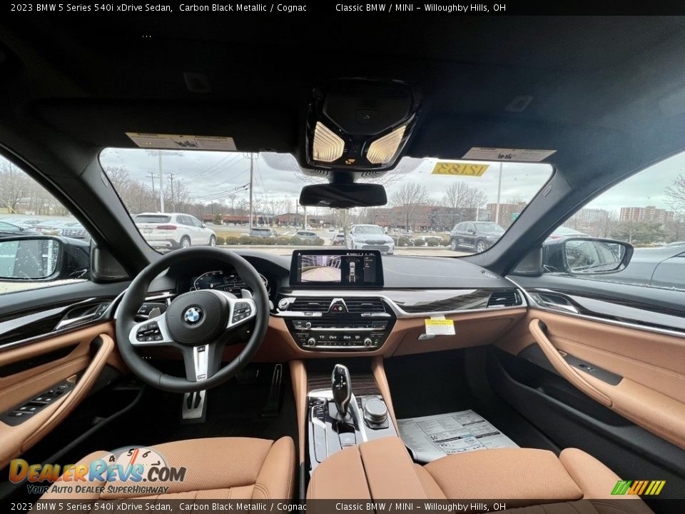 Front Seat of 2023 BMW 5 Series 540i xDrive Sedan Photo #9