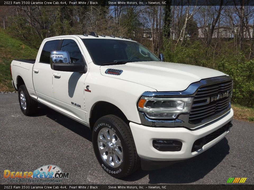 Front 3/4 View of 2023 Ram 3500 Laramie Crew Cab 4x4 Photo #4