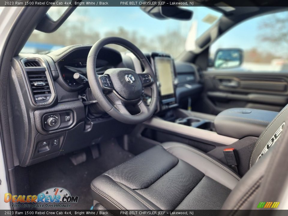 Front Seat of 2023 Ram 1500 Rebel Crew Cab 4x4 Photo #12