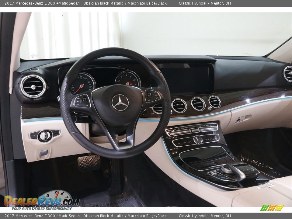 Dashboard of 2017 Mercedes-Benz E 300 4Matic Sedan Photo #7