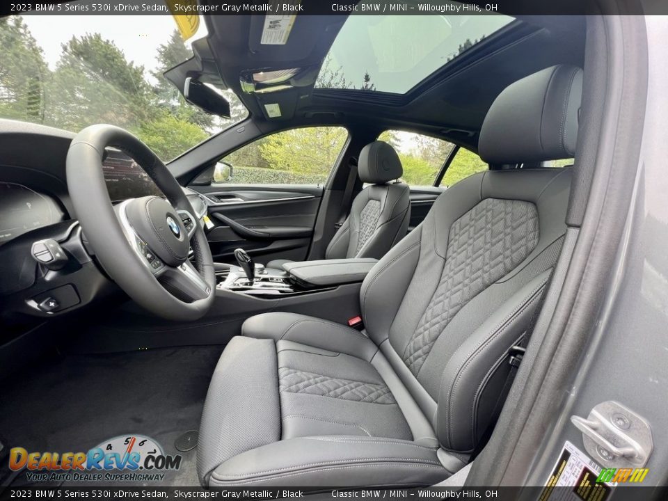 Front Seat of 2023 BMW 5 Series 530i xDrive Sedan Photo #10