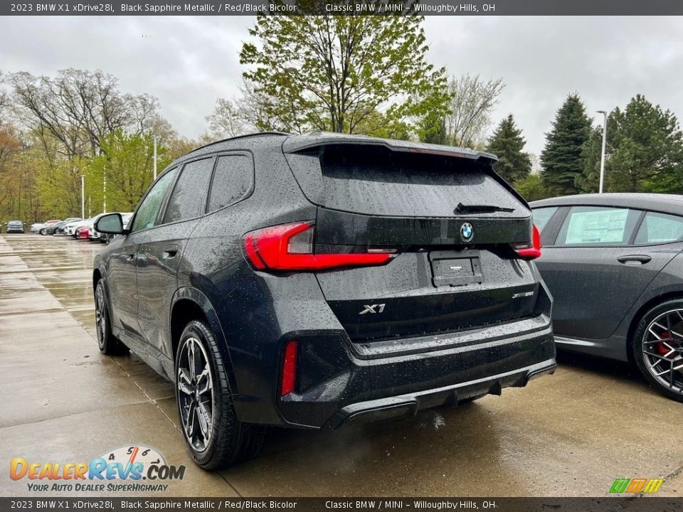 2023 BMW X1 xDrive28i Black Sapphire Metallic / Red/Black Bicolor Photo #3