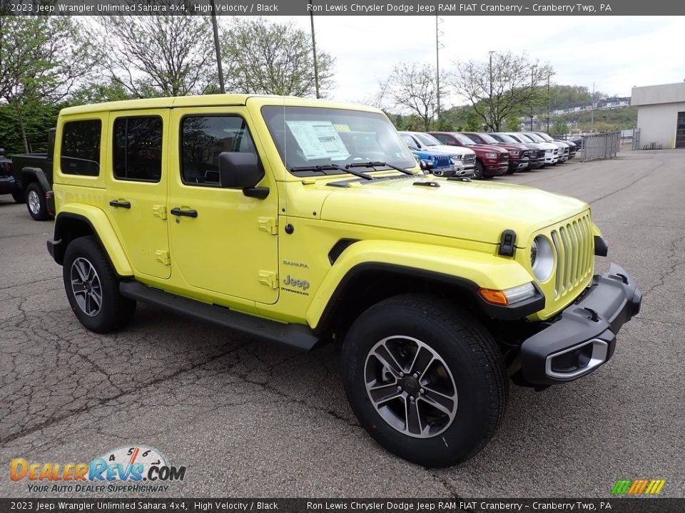 Front 3/4 View of 2023 Jeep Wrangler Unlimited Sahara 4x4 Photo #7