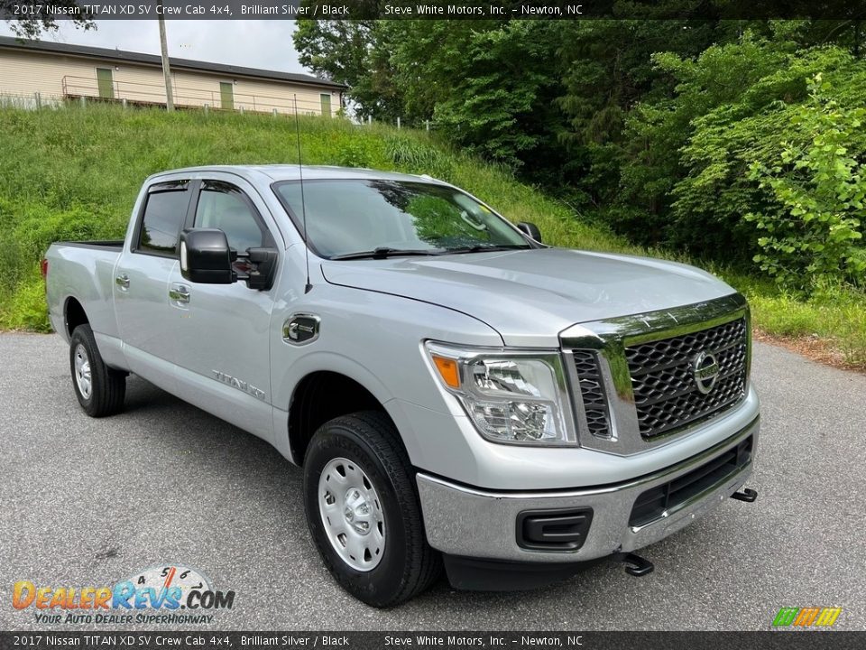 Front 3/4 View of 2017 Nissan TITAN XD SV Crew Cab 4x4 Photo #4