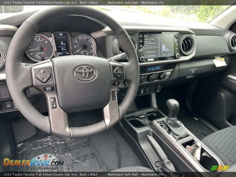 Dashboard of 2023 Toyota Tacoma Trail Edition Double Cab 4x4 Photo #3