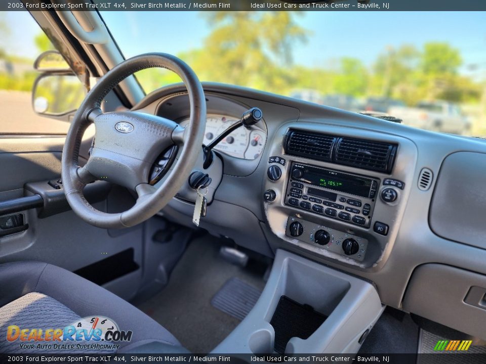 Dashboard of 2003 Ford Explorer Sport Trac XLT 4x4 Photo #11