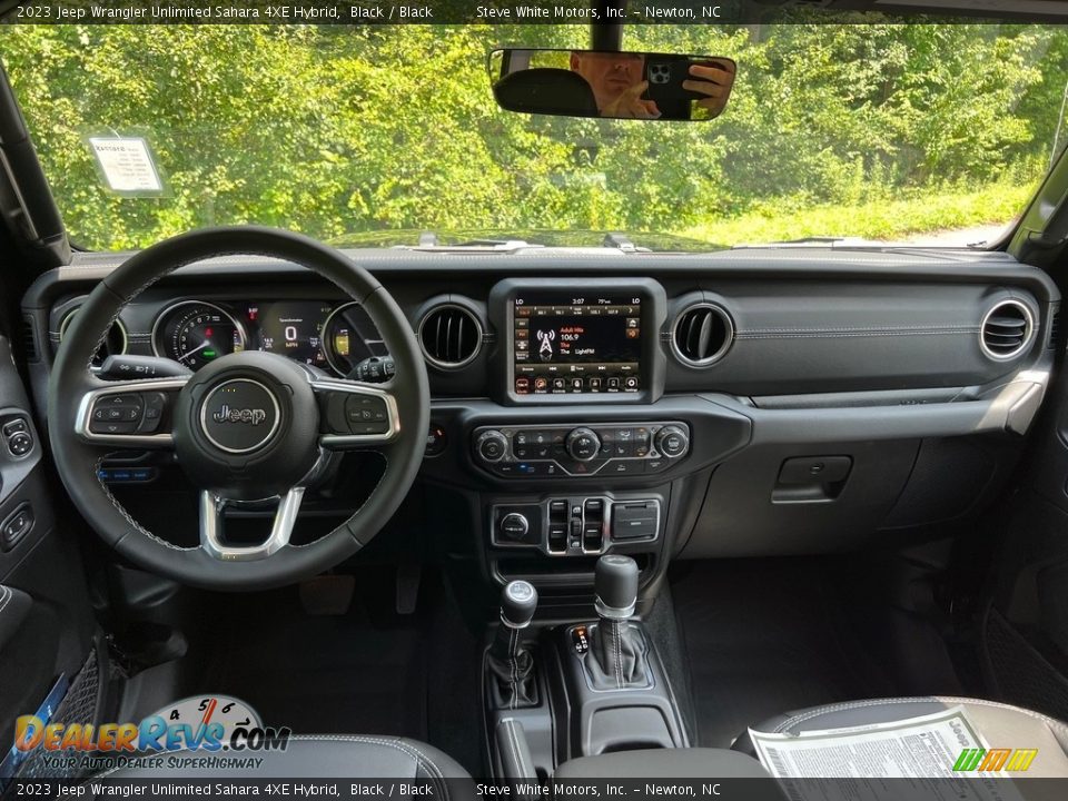 Dashboard of 2023 Jeep Wrangler Unlimited Sahara 4XE Hybrid Photo #15