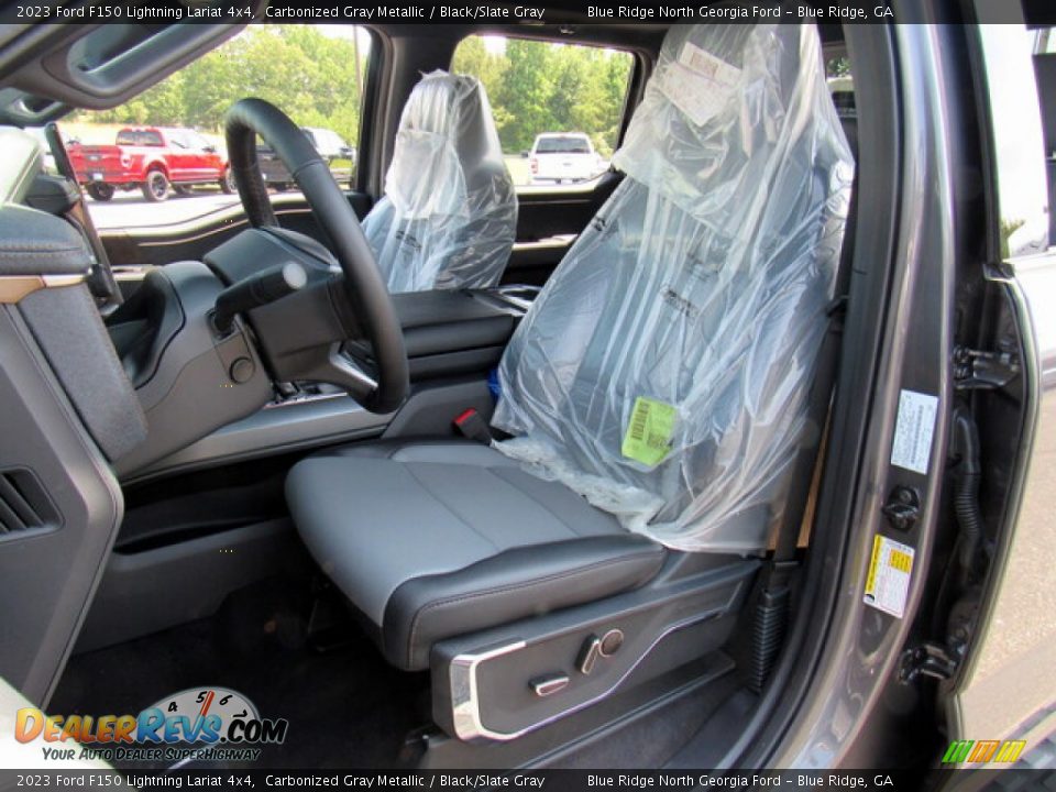 Front Seat of 2023 Ford F150 Lightning Lariat 4x4 Photo #10