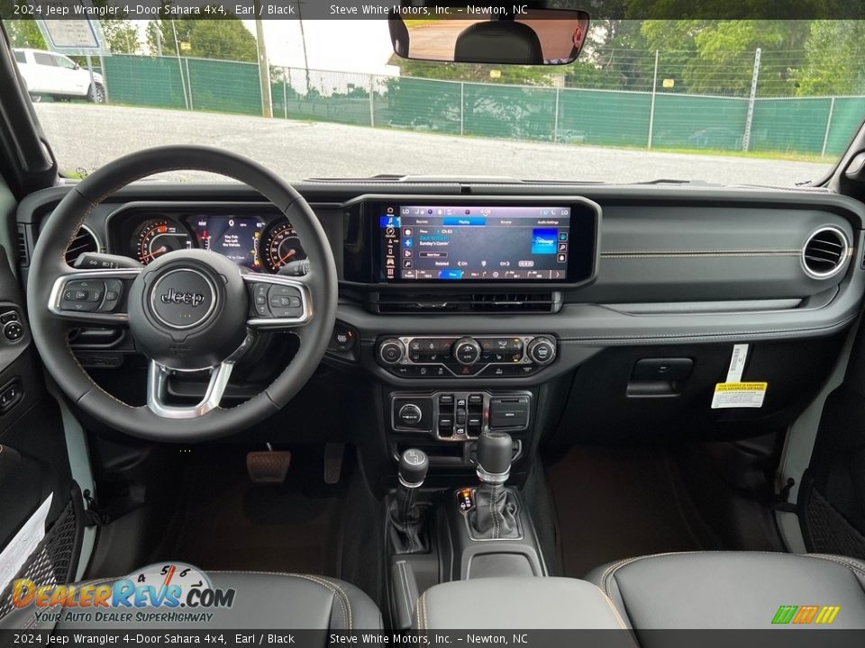 Dashboard of 2024 Jeep Wrangler 4-Door Sahara 4x4 Photo #20