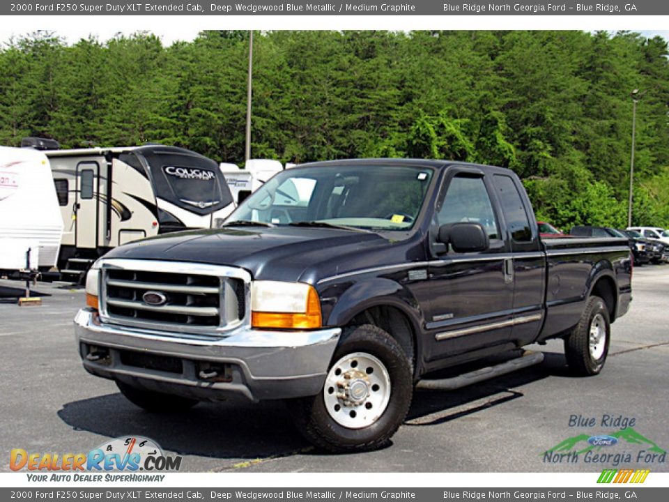 Front 3/4 View of 2000 Ford F250 Super Duty XLT Extended Cab Photo #1