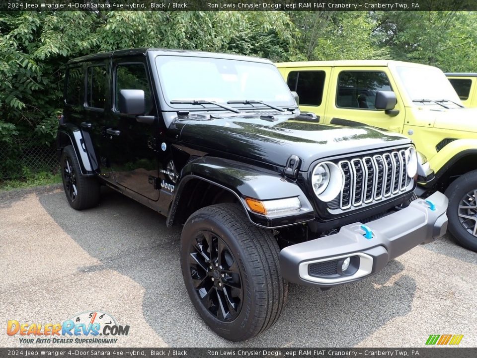 Front 3/4 View of 2024 Jeep Wrangler 4-Door Sahara 4xe Hybrid Photo #3