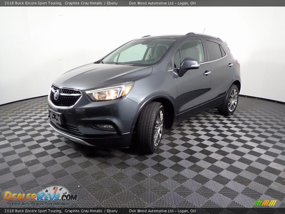 Front 3/4 View of 2018 Buick Encore Sport Touring Photo #6