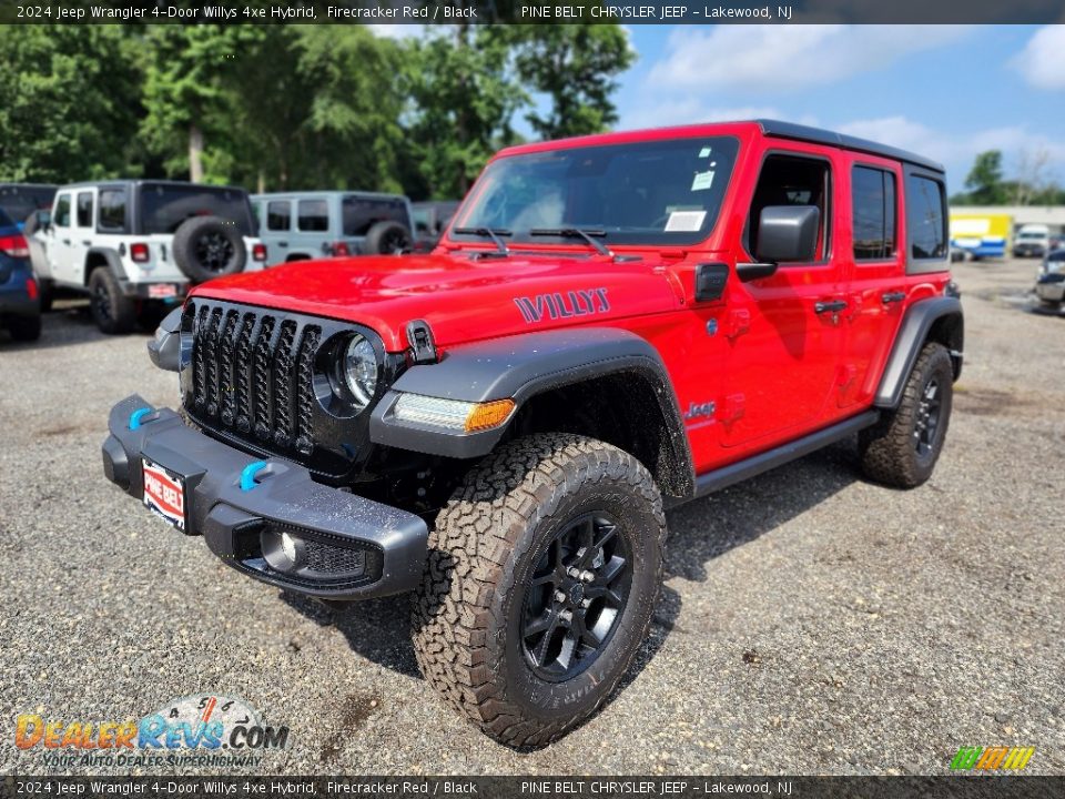 Front 3/4 View of 2024 Jeep Wrangler 4-Door Willys 4xe Hybrid Photo #1