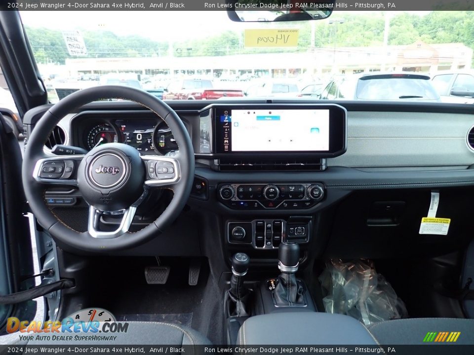 Dashboard of 2024 Jeep Wrangler 4-Door Sahara 4xe Hybrid Photo #14